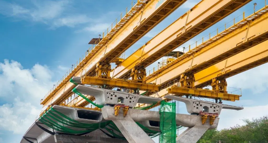 Bridge construction with yellow beams.