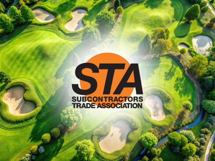 STA Subcontractors Trade Association logo on golf course.