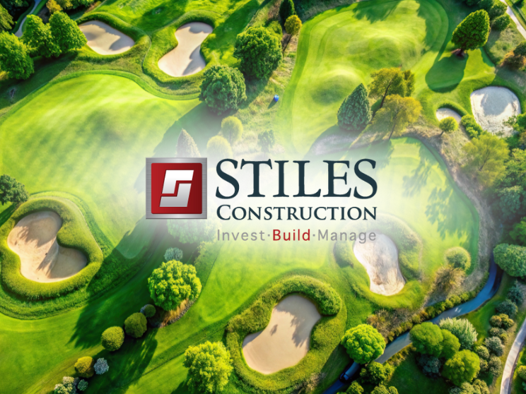 Aerial view of a golf course with Stiles Construction logo.