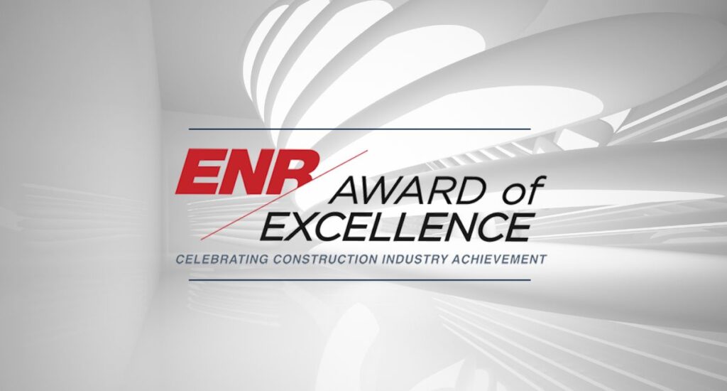 image of sleek curved wall with ENR logo for the Awards of Excellence