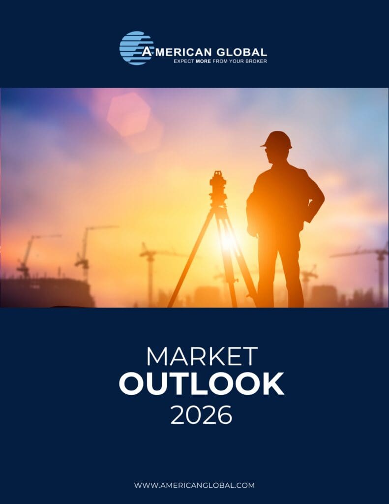 A contractor with survey equipment in front of a sunset construction site