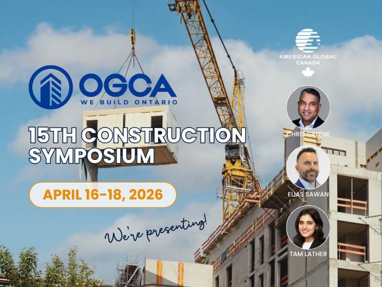 Construction symposium event with crane and speakers.