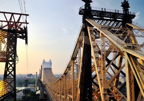 A close-up of a bridge's steel structure.